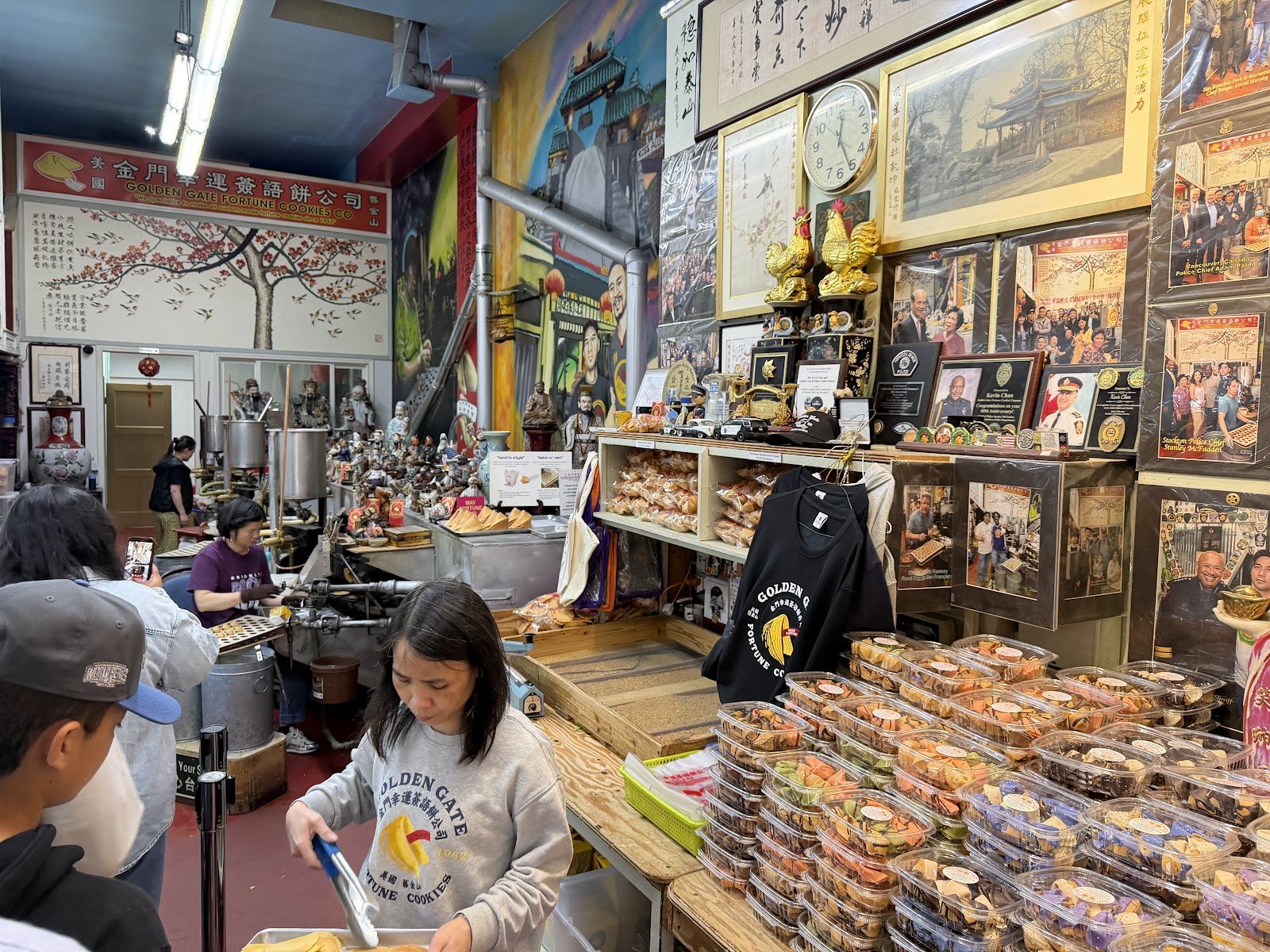 The fortune cookies in Ross Alley are still folded by hand, and you can just stand there and watch