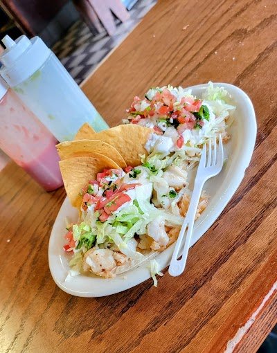 El Buen Sabor: the salsa is free and unlimited, and the reviews split on the burrito